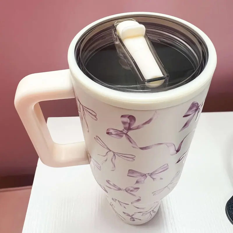 Cream Handled Tumbler With Lavender Bow Print