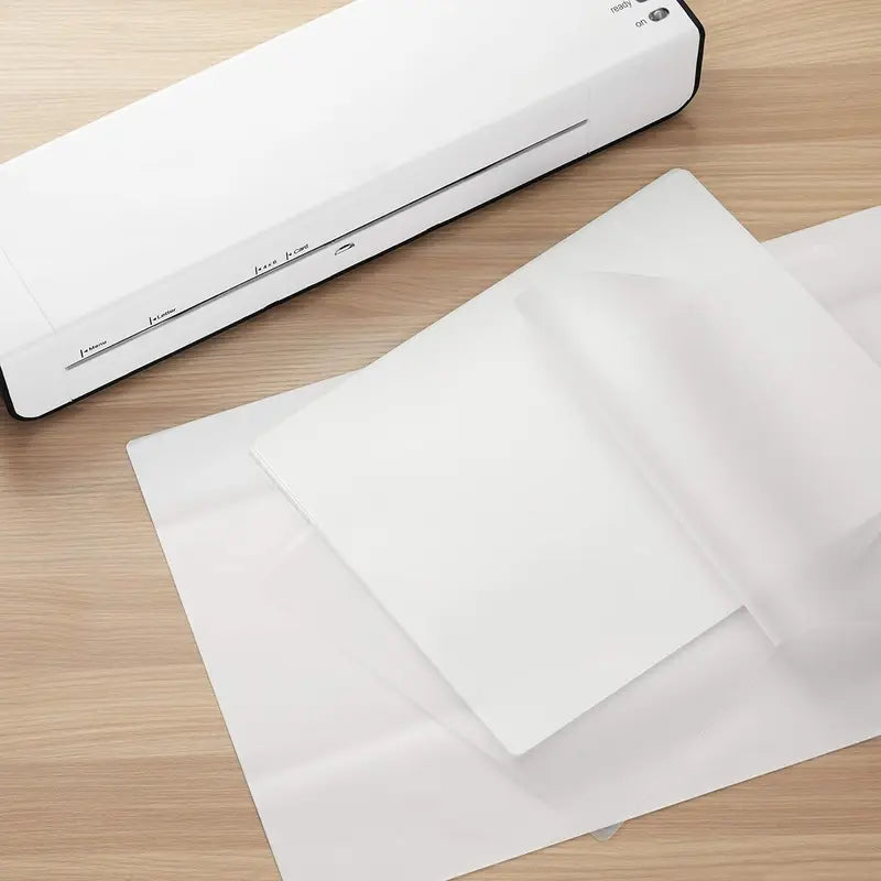Stack of Clear Laminating Pouch Sheets